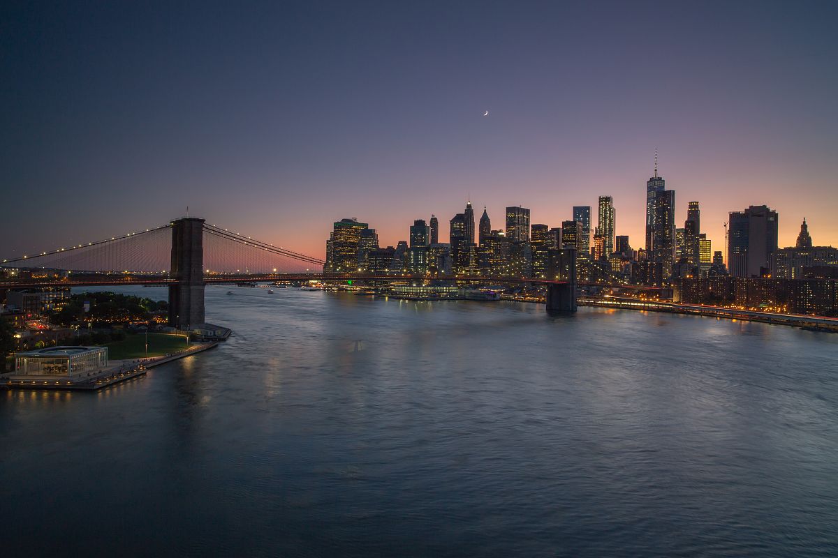 Cruiser crossing East River during sunset example image 1