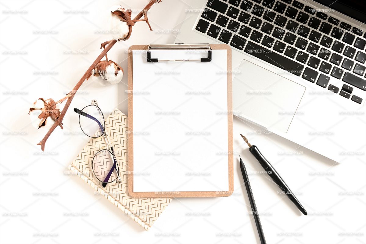 Workspace with clipboard mockup, laptop, glasses, notepads example image 1