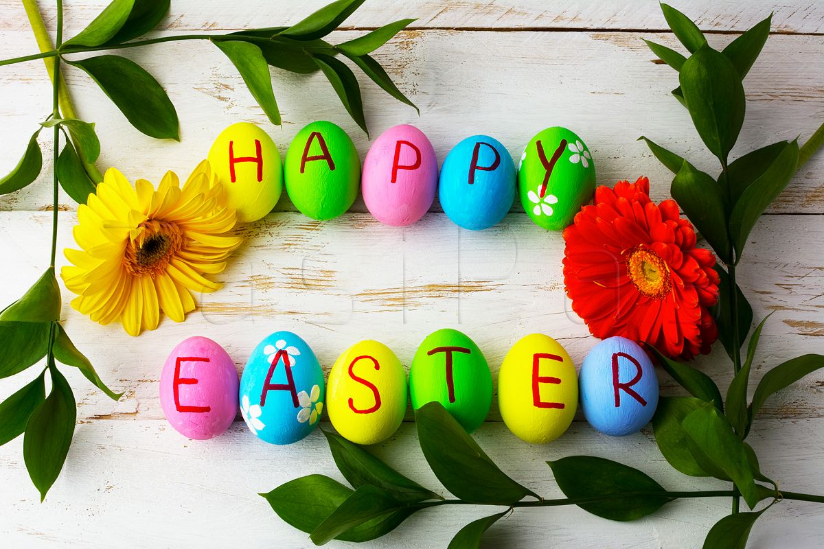 Easter eggs on a white wooden background. example image 1