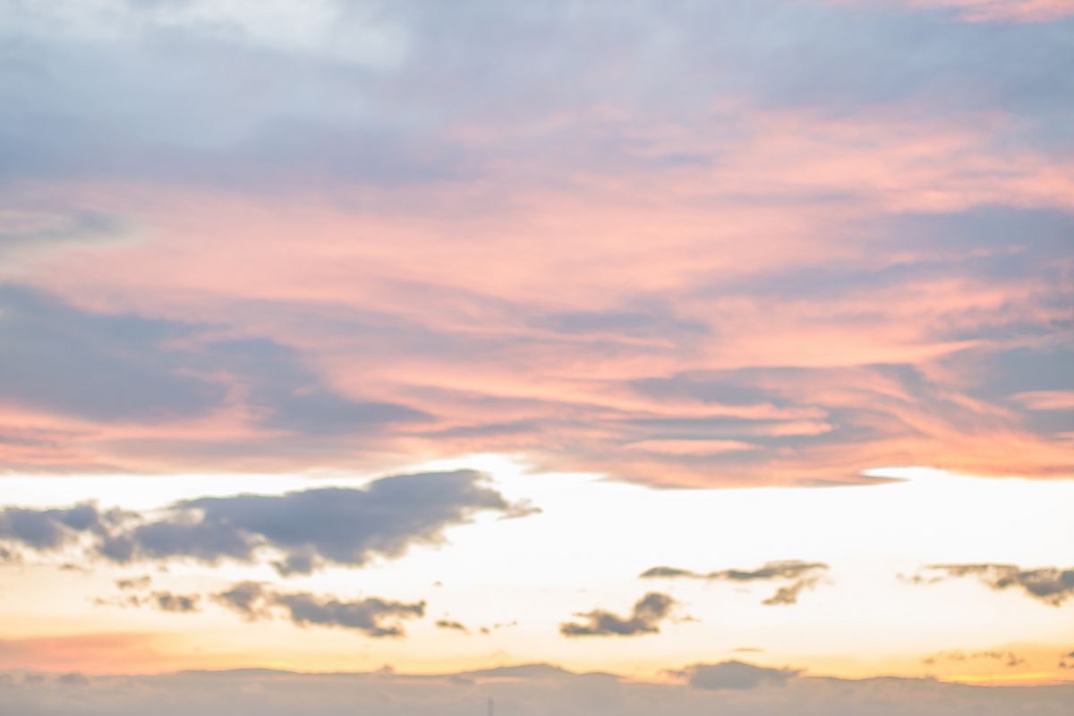 Man watching sunset on the hill example image 1