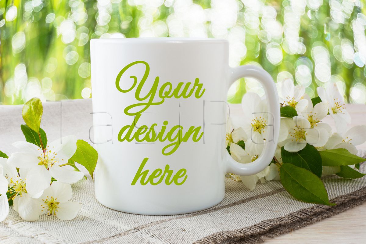 Mug mockup with apple blossom. example image 1