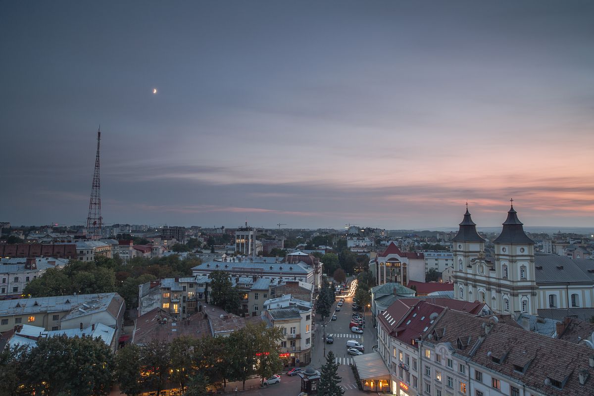 Aerial view of old European city during sunset example image 1