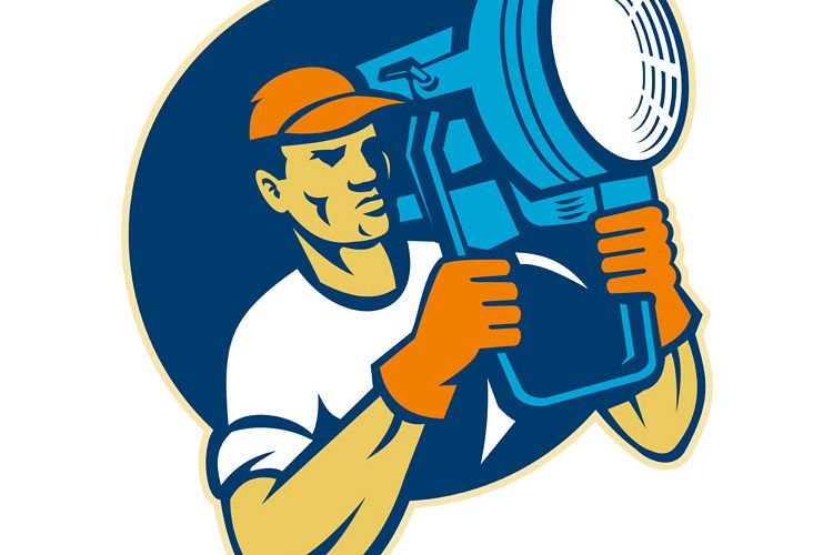 film lighting crew holding a spotlight example image 1