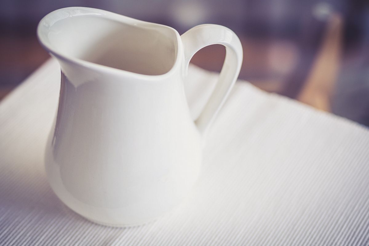 Milk Jug on a Glass Table - Cold Tone