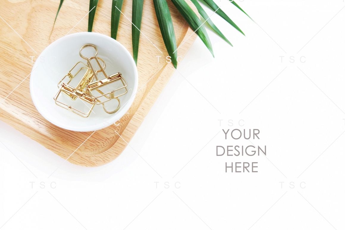 Paper Clips, Wooden Tray and Palm Leaf Stock Photo example image 1