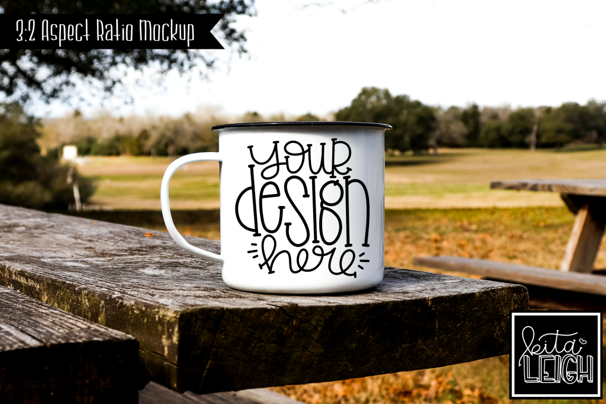 White Campfire Mug on a Picnic Table Mockup example image 1