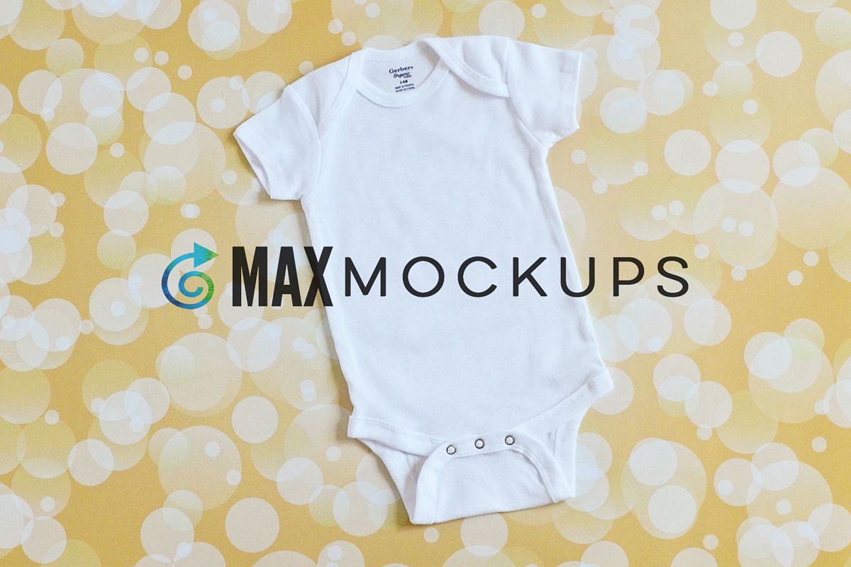 Download White baby bodysuit mockup, flatlay, with gold backdrop ...