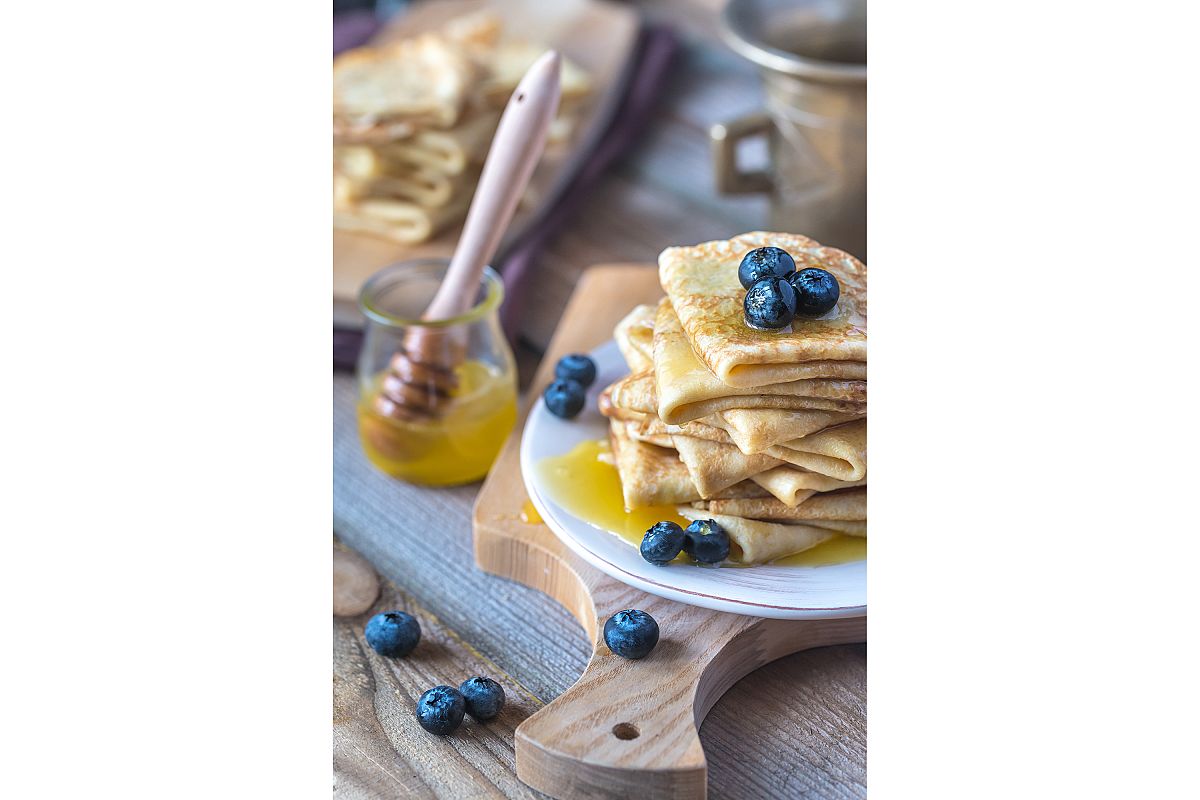Crepes with fresh blueberries and honey example image 1