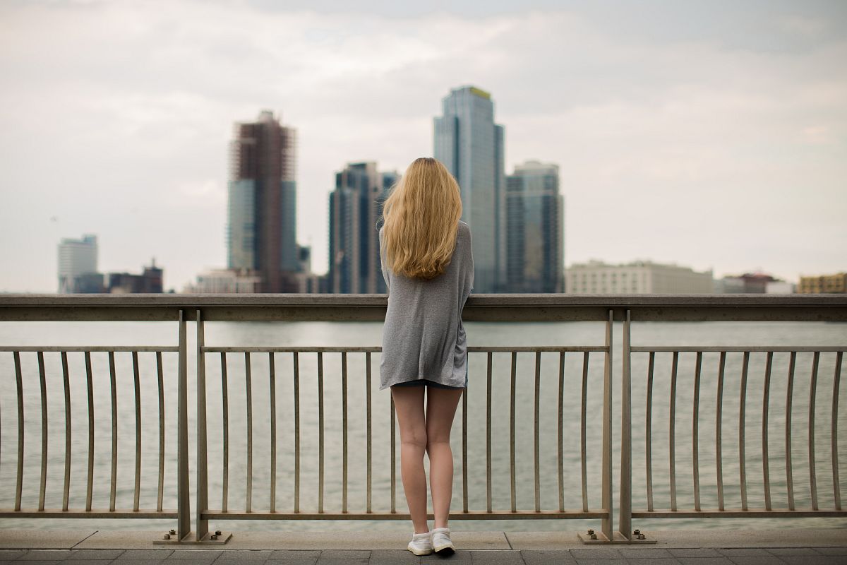 Girl on a pier at Manhattan example image 1