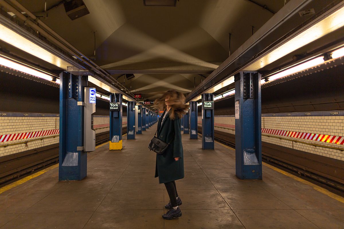 Girl dancing in the subway station example image 1