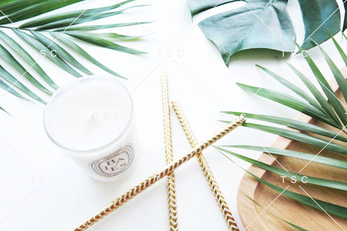 Tropical Leaves and Candle Stock Photo example image 1