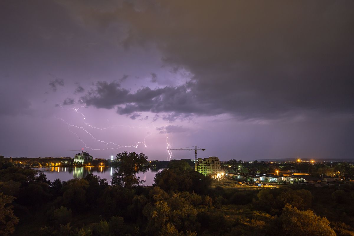 Thunder and lightning storm at night in the village example image 1