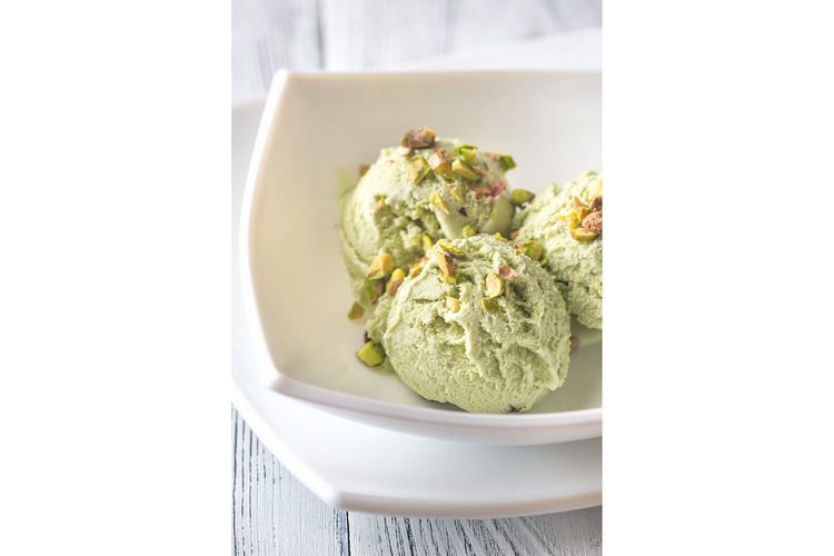 Pistachio ice cream in the bowl example image 1