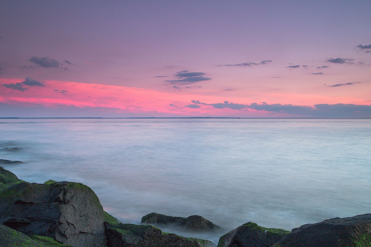 Sunset on a rock moss beach example image 1