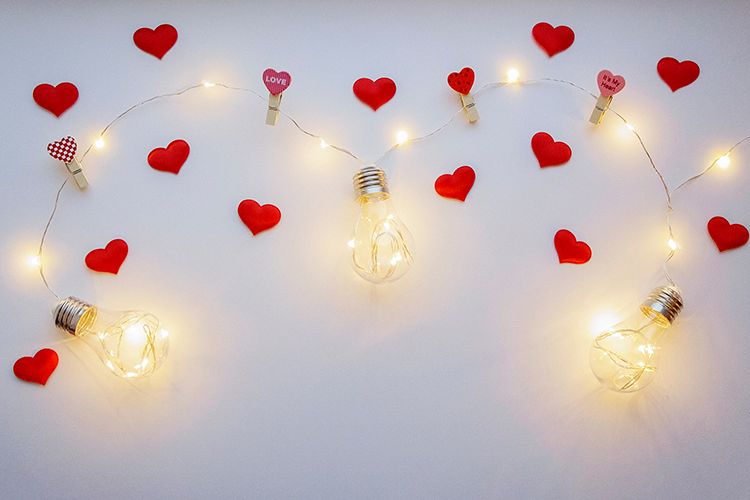 White background with lamps and small red hearts example image 1